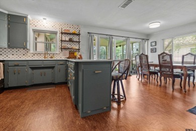 Located in the desirable Hideaway Lake Community, this charming on Hide-A-Way Lake Golf Course in Texas - for sale on GolfHomes.com, golf home, golf lot