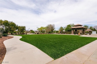 Experience luxury living in guard-gated Club Aliante! This on Aliante Golf Club in Nevada - for sale on GolfHomes.com, golf home, golf lot
