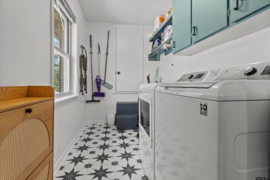 Located in the desirable Hideaway Lake Community, this charming on Hide-A-Way Lake Golf Course in Texas - for sale on GolfHomes.com, golf home, golf lot