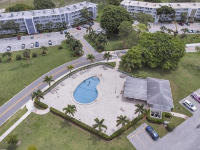 Stunning and Spacious Condo with Panaramic Water Views on Hillsboro Pines Golf in Florida - for sale on GolfHomes.com, golf home, golf lot