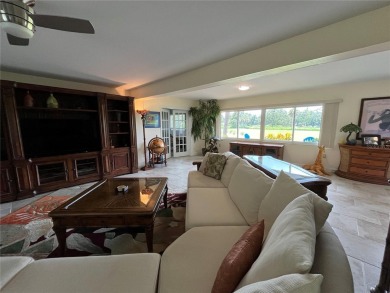 Beautifully Updated GOLF COURSE Frontage Home with the ABSOLUTE on Village Green Golf Club of Sarasota in Florida - for sale on GolfHomes.com, golf home, golf lot