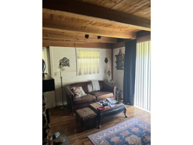 Welcome Home! Located on 10.05 acres, this 4 bedroom, 2 bath on Lake St. Catherine Country Club in Vermont - for sale on GolfHomes.com, golf home, golf lot