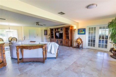 Beautifully Updated GOLF COURSE Frontage Home with the ABSOLUTE on Village Green Golf Club of Sarasota in Florida - for sale on GolfHomes.com, golf home, golf lot