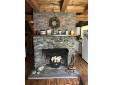 Welcome Home! Located on 10.05 acres, this 4 bedroom, 2 bath on Lake St. Catherine Country Club in Vermont - for sale on GolfHomes.com, golf home, golf lot