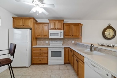Welcome to this beautifully maintained 2-bedroom, 2-bath condo on Kingsway Country Club in Florida - for sale on GolfHomes.com, golf home, golf lot