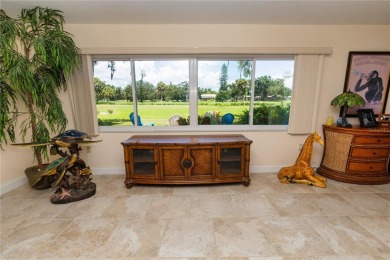 Beautifully Updated GOLF COURSE Frontage Home with the ABSOLUTE on Village Green Golf Club of Sarasota in Florida - for sale on GolfHomes.com, golf home, golf lot
