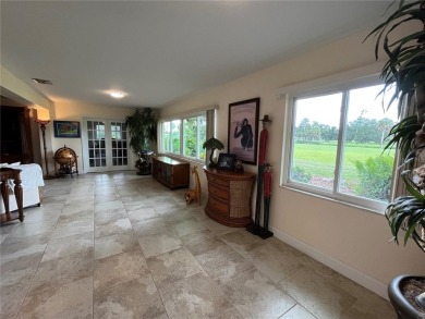 Beautifully Updated GOLF COURSE Frontage Home with the ABSOLUTE on Village Green Golf Club of Sarasota in Florida - for sale on GolfHomes.com, golf home, golf lot