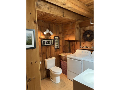Welcome Home! Located on 10.05 acres, this 4 bedroom, 2 bath on Lake St. Catherine Country Club in Vermont - for sale on GolfHomes.com, golf home, golf lot