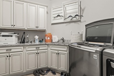 This impeccably maintained patio home combines practicality on TPC Myrtle Beach Golf Club in South Carolina - for sale on GolfHomes.com, golf home, golf lot