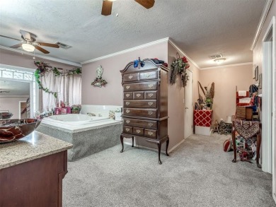 Spacious Multi-Generational Retreat with Pool Oasis on 1.46 on Oak Tree National Golf and Country Club in Oklahoma - for sale on GolfHomes.com, golf home, golf lot