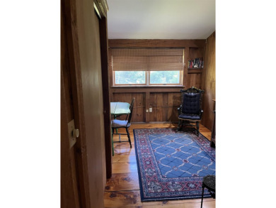 Welcome Home! Located on 10.05 acres, this 4 bedroom, 2 bath on Lake St. Catherine Country Club in Vermont - for sale on GolfHomes.com, golf home, golf lot