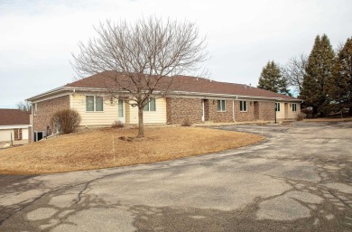 Enjoy golf course living with this charming 2-bedroom condo on Waverly Municipal Golf Course in Iowa - for sale on GolfHomes.com, golf home, golf lot