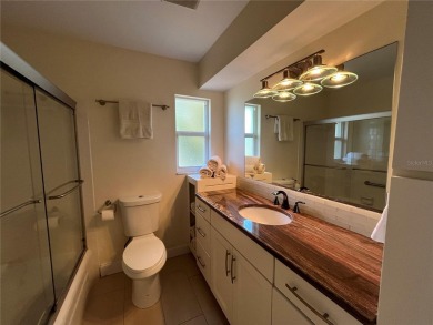 Beautifully Updated GOLF COURSE Frontage Home with the ABSOLUTE on Village Green Golf Club of Sarasota in Florida - for sale on GolfHomes.com, golf home, golf lot