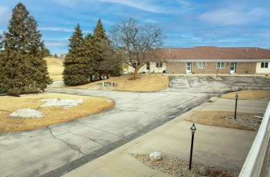 Enjoy golf course living with this charming 2-bedroom condo on Waverly Municipal Golf Course in Iowa - for sale on GolfHomes.com, golf home, golf lot