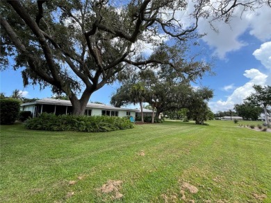 Beautifully Updated GOLF COURSE Frontage Home with the ABSOLUTE on Village Green Golf Club of Sarasota in Florida - for sale on GolfHomes.com, golf home, golf lot