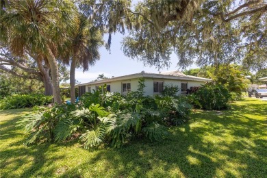 Beautifully Updated GOLF COURSE Frontage Home with the ABSOLUTE on Village Green Golf Club of Sarasota in Florida - for sale on GolfHomes.com, golf home, golf lot