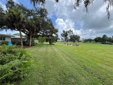 Beautifully Updated GOLF COURSE Frontage Home with the ABSOLUTE on Village Green Golf Club of Sarasota in Florida - for sale on GolfHomes.com, golf home, golf lot