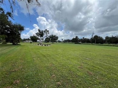 Beautifully Updated GOLF COURSE Frontage Home with the ABSOLUTE on Village Green Golf Club of Sarasota in Florida - for sale on GolfHomes.com, golf home, golf lot