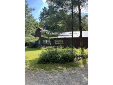 Welcome Home! Located on 10.05 acres, this 4 bedroom, 2 bath on Lake St. Catherine Country Club in Vermont - for sale on GolfHomes.com, golf home, golf lot