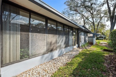 An attractive and comfortable villa home in the Pinewinds on East Lake Woodlands Country Club in Florida - for sale on GolfHomes.com, golf home, golf lot