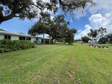 Beautifully Updated GOLF COURSE Frontage Home with the ABSOLUTE on Village Green Golf Club of Sarasota in Florida - for sale on GolfHomes.com, golf home, golf lot