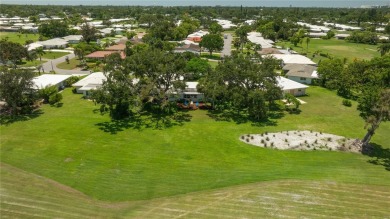 Beautifully Updated GOLF COURSE Frontage Home with the ABSOLUTE on Village Green Golf Club of Sarasota in Florida - for sale on GolfHomes.com, golf home, golf lot