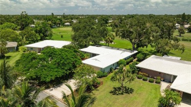 Beautifully Updated GOLF COURSE Frontage Home with the ABSOLUTE on Village Green Golf Club of Sarasota in Florida - for sale on GolfHomes.com, golf home, golf lot