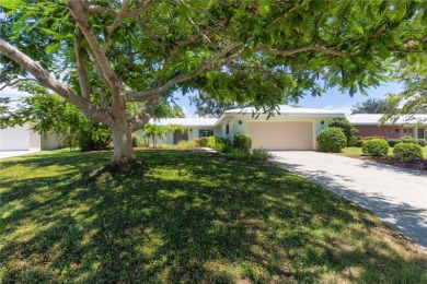 Beautifully Updated GOLF COURSE Frontage Home with the ABSOLUTE on Village Green Golf Club of Sarasota in Florida - for sale on GolfHomes.com, golf home, golf lot