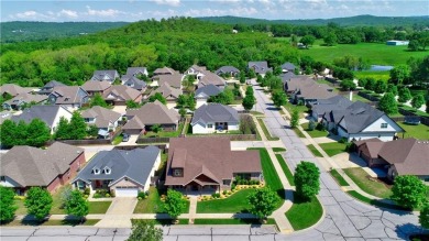 Welcome to this charming  spacious 4-bedroom, 4-bath home in a on Stonebridge Meadows Golf Club in Arkansas - for sale on GolfHomes.com, golf home, golf lot