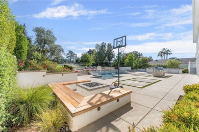 This charming home was built in 2017 and has a timeless East on Redlands Country Club in California - for sale on GolfHomes.com, golf home, golf lot