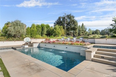 This charming home was built in 2017 and has a timeless East on Redlands Country Club in California - for sale on GolfHomes.com, golf home, golf lot