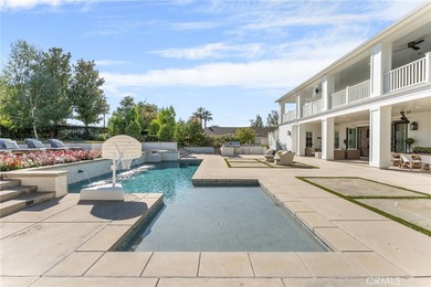 This charming home was built in 2017 and has a timeless East on Redlands Country Club in California - for sale on GolfHomes.com, golf home, golf lot