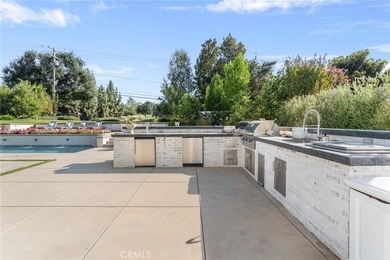 This charming home was built in 2017 and has a timeless East on Redlands Country Club in California - for sale on GolfHomes.com, golf home, golf lot