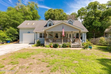Welcome to this beautifully maintained 4-bedroom, 2-bath coastal on The Country Club of the Crystal Coast in North Carolina - for sale on GolfHomes.com, golf home, golf lot