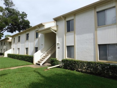 Just what you have been waiting for....! FIRST floor, pet on East Lake Woodlands Country Club in Florida - for sale on GolfHomes.com, golf home, golf lot