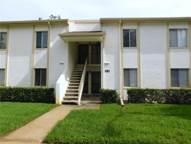 Just what you have been waiting for....! FIRST floor, pet on East Lake Woodlands Country Club in Florida - for sale on GolfHomes.com, golf home, golf lot