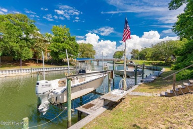 Welcome to this beautifully maintained 4-bedroom, 2-bath coastal on The Country Club of the Crystal Coast in North Carolina - for sale on GolfHomes.com, golf home, golf lot