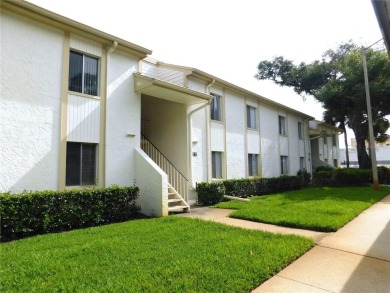 Just what you have been waiting for....! FIRST floor, pet on East Lake Woodlands Country Club in Florida - for sale on GolfHomes.com, golf home, golf lot