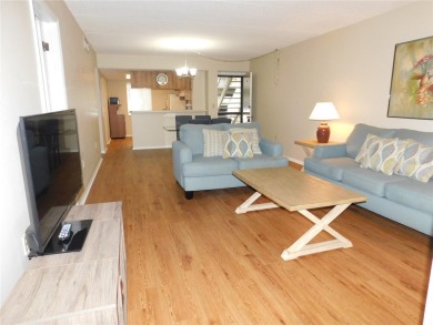 Just what you have been waiting for....! FIRST floor, pet on East Lake Woodlands Country Club in Florida - for sale on GolfHomes.com, golf home, golf lot