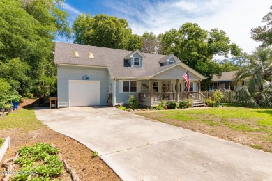 Welcome to this beautifully maintained 4-bedroom, 2-bath coastal on The Country Club of the Crystal Coast in North Carolina - for sale on GolfHomes.com, golf home, golf lot