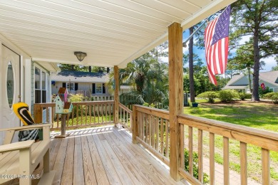 Welcome to this beautifully maintained 4-bedroom, 2-bath coastal on The Country Club of the Crystal Coast in North Carolina - for sale on GolfHomes.com, golf home, golf lot