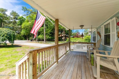 Welcome to this beautifully maintained 4-bedroom, 2-bath coastal on The Country Club of the Crystal Coast in North Carolina - for sale on GolfHomes.com, golf home, golf lot