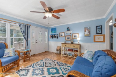 Welcome to this beautifully maintained 4-bedroom, 2-bath coastal on The Country Club of the Crystal Coast in North Carolina - for sale on GolfHomes.com, golf home, golf lot