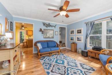 Welcome to this beautifully maintained 4-bedroom, 2-bath coastal on The Country Club of the Crystal Coast in North Carolina - for sale on GolfHomes.com, golf home, golf lot