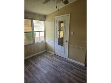 Welcome to this COMPLETELY UPDATED home in Orange Blossom, The on Stonecrest Golf and Club Club in Florida - for sale on GolfHomes.com, golf home, golf lot