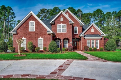 If a large, beautifully landscaped yard, golf course community on Myrtle Beach National Golf Course in South Carolina - for sale on GolfHomes.com, golf home, golf lot