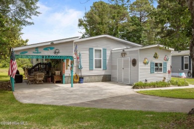 Welcome to your dream retreat in the serene community of Topsail on Topsail Green Golf Club in North Carolina - for sale on GolfHomes.com, golf home, golf lot