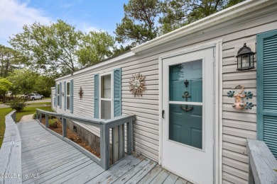 Welcome to your dream retreat in the serene community of Topsail on Topsail Green Golf Club in North Carolina - for sale on GolfHomes.com, golf home, golf lot