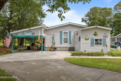 Welcome to your dream retreat in the serene community of Topsail on Topsail Green Golf Club in North Carolina - for sale on GolfHomes.com, golf home, golf lot