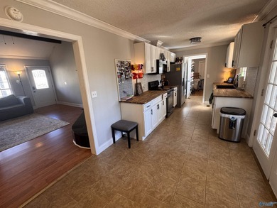 Gorgeous 4 bedroom home on a corner lot inside Arab city limits! on Twin Lakes Golf Course in Alabama - for sale on GolfHomes.com, golf home, golf lot